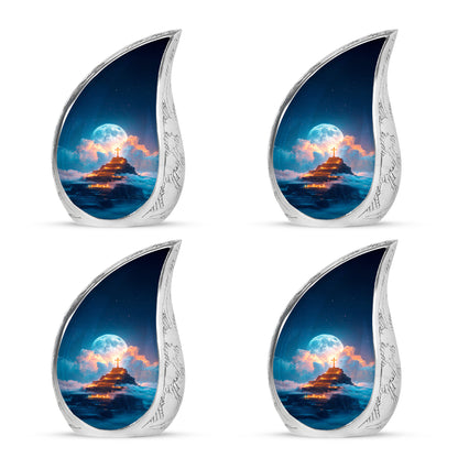 Calming Blue Cross Cremation Urn close-up of engraving and surface detail - graceful tear-shaped urn with cross motif - 10 inch aluminum urn for cremated remains