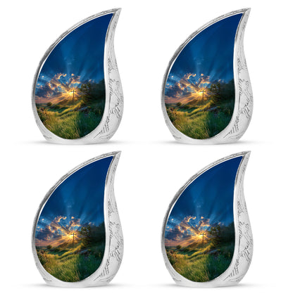 Indigo Cross Cremation Urn close-up of engraving and surface detail - flowing teardrop cross silhouette on curved aluminum - 10 inch aluminum urn for cremated remains