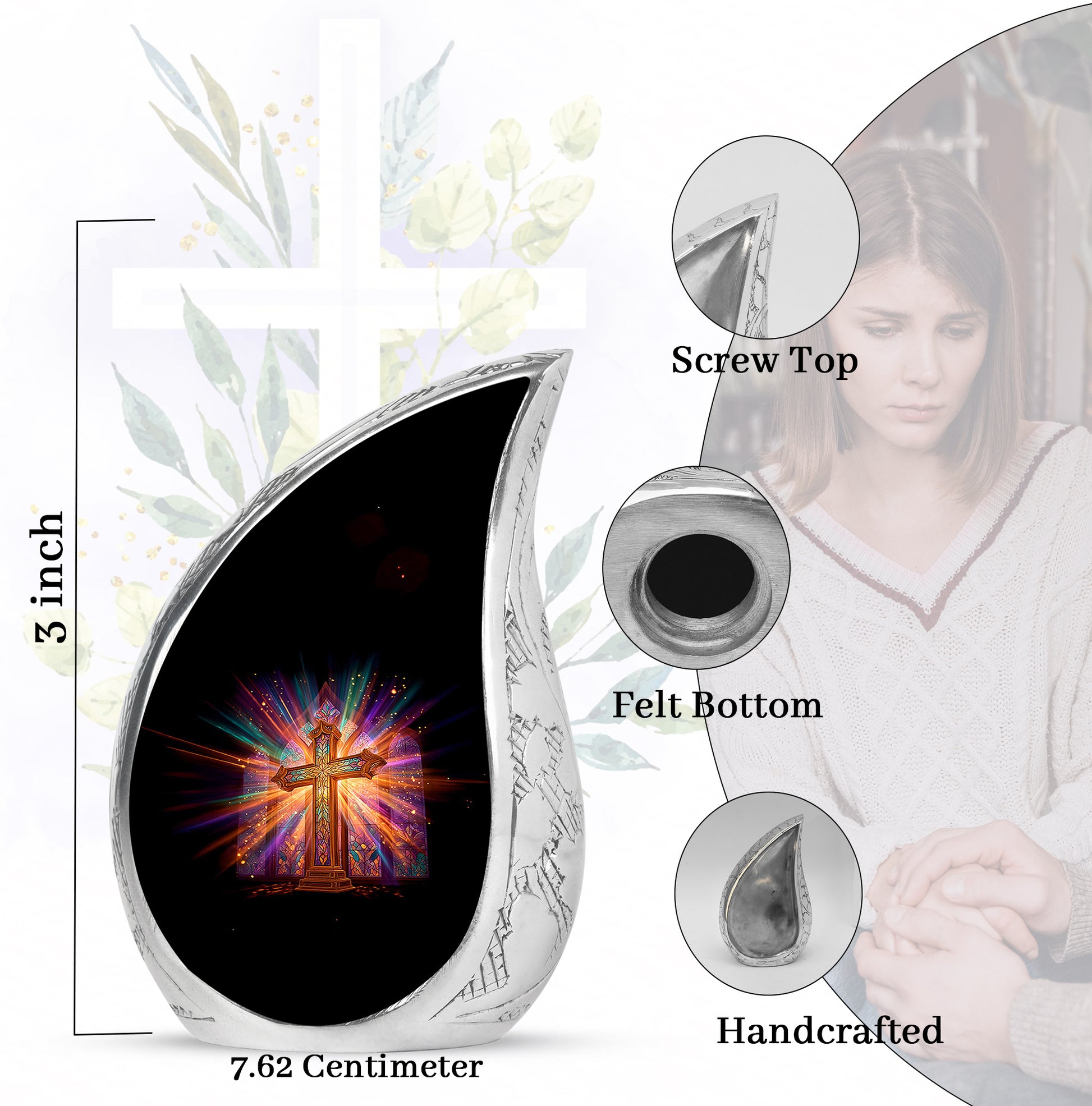 Ebony Cross Cremation Urn angled view of lid and engraved motif - flowing teardrop cross silhouette on curved aluminum - mini keepsake memorial for portion of cremation ashes