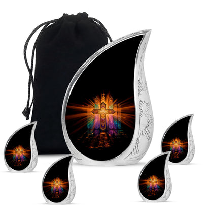 Midnight Black Cross Cremation Urn side profile showing urn shape - graceful tear-shaped urn with cross motif - memorial set with one large and four small urns