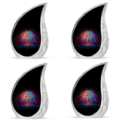 Dark Black Cross Cremation Urn close-up of engraving and surface detail - graceful tear-shaped urn with cross motif - 10 inch aluminum urn for cremated remains