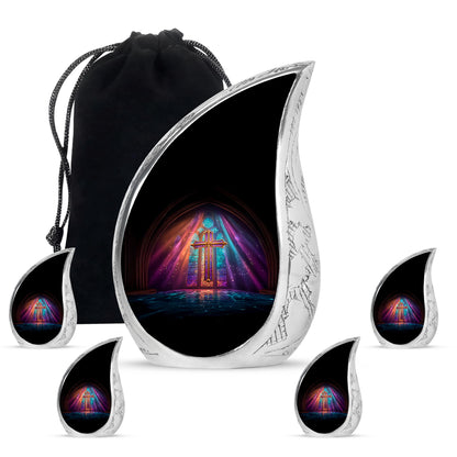 Jet Black Cross Cremation Urn side profile showing urn shape - flowing teardrop cross silhouette on curved aluminum - memorial set with one large and four small urns