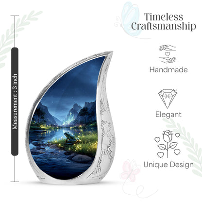 Powder Blue Frog Cremation Urn angled view of lid and engraved motif - rounded teardrop frog design with delicate detail - mini keepsake memorial for portion of cremation ashes