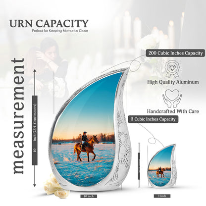 Gleaming Silver Horse Polo Cremation Urn angled view of lid and engraved motif - rounded teardrop horse polo design with delicate detail - mini keepsake memorial for portion of cremation ashes