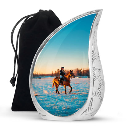 Gleaming Silver Horse Polo Cremation Urn front view showing detailed design - rounded teardrop horse polo design with delicate detail - full-size 10 inch 200 cubic inch adult cremation urn