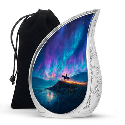 Misty Blue Horse Polo Cremation Urn front view showing detailed design - flowing teardrop horse polo silhouette on curved aluminum - full-size 10 inch 200 cubic inch adult cremation urn
