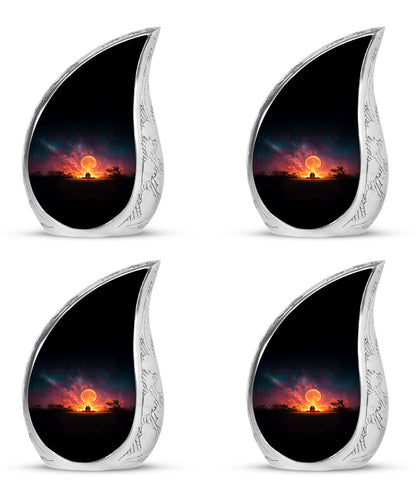 Rich Black Campfire Cremation Urn close-up of engraving and surface detail - rounded teardrop campfire design with delicate detail - 10 inch aluminum urn for cremated remains