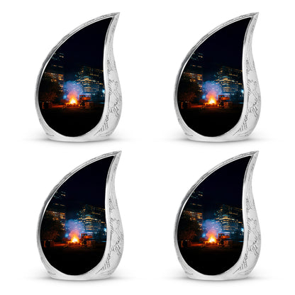 Glossy Black Campfire Cremation Urn close-up of engraving and surface detail - rounded teardrop campfire design with delicate detail - 10 inch aluminum urn for cremated remains