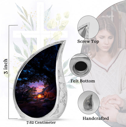 Onyx Black Campfire Cremation Urn angled view of lid and engraved motif - smooth teardrop contour featuring campfire art - mini keepsake memorial for portion of cremation ashes