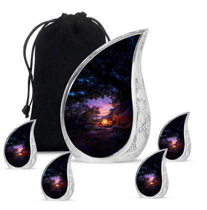 Charcoal Black Campfire Cremation Urn side profile showing urn shape - smooth teardrop contour featuring campfire art - memorial set with one large and four small urns