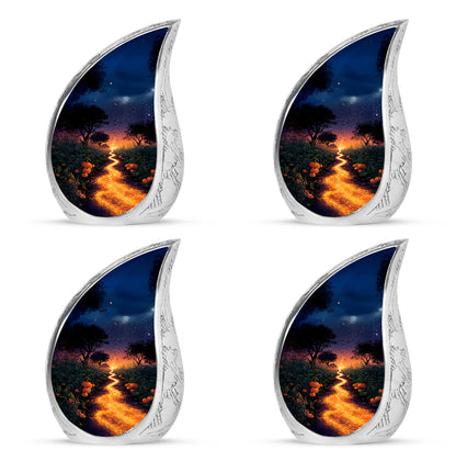 Cobalt Blue Halloween Cremation Urn close-up of engraving and surface detail - graceful tear-shaped urn with halloween motif - 10 inch aluminum urn for cremated remains