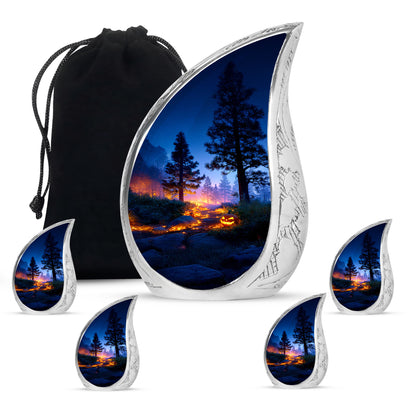 Cobalt Blue Halloween Cremation Urn side profile showing urn shape - graceful tear-shaped urn with halloween motif - memorial set with one large and four small urns