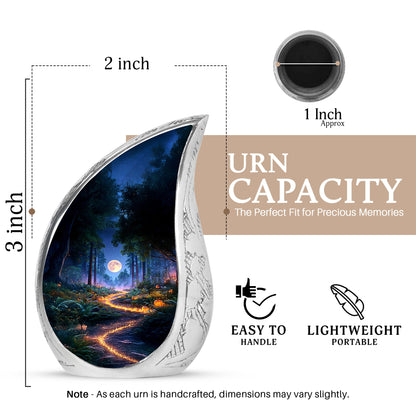 Dusty Blue Halloween Cremation Urn angled view of lid and engraved motif - flowing teardrop halloween silhouette on curved aluminum - mini keepsake memorial for portion of cremation ashes