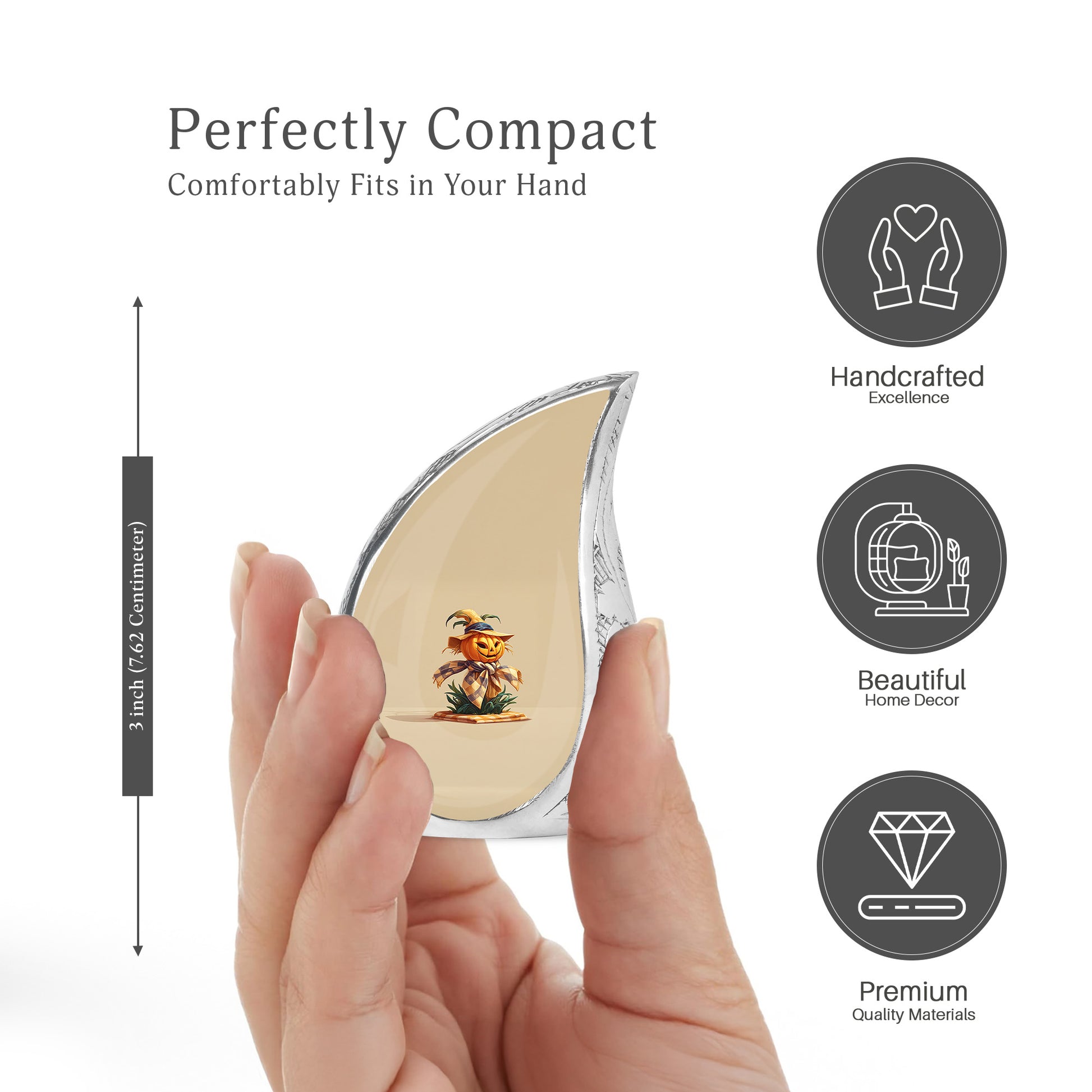 Burnished Gold Halloween Cremation Urn angled view of lid and engraved motif - smooth teardrop contour featuring halloween art - mini keepsake memorial for portion of cremation ashes