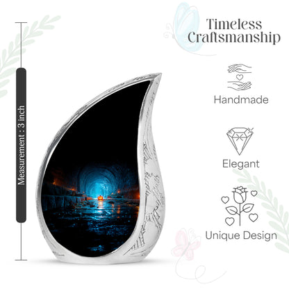 Obsidian Black Halloween Cremation Urn angled view of lid and engraved motif - smooth teardrop contour featuring halloween art - mini keepsake memorial for portion of cremation ashes