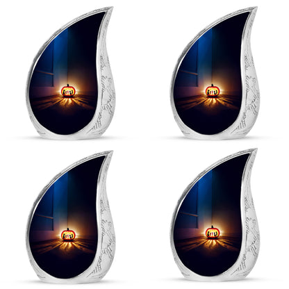 Vivid Blue Halloween Cremation Urn close-up of engraving and surface detail - graceful tear-shaped urn with halloween motif - 10 inch aluminum urn for cremated remains