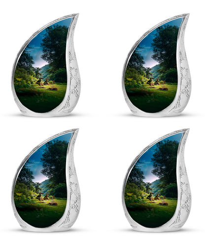 Cobalt Blue Hornbill Cremation Urn close-up of engraving and surface detail - graceful tear-shaped urn with hornbill motif - 10 inch aluminum urn for cremated remains