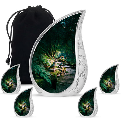 Jade Green Hornbill Cremation Urn side profile showing urn shape - rounded teardrop hornbill design with delicate detail - memorial set with one large and four small urns