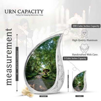 Hunter Green Hornbill Cremation Urn angled view of lid and engraved motif - graceful tear-shaped urn with hornbill motif - mini keepsake memorial for portion of cremation ashes