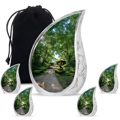 Jade Green Hornbill Cremation Urn side profile showing urn shape - rounded teardrop hornbill design with delicate detail - memorial set with one large and four small urns