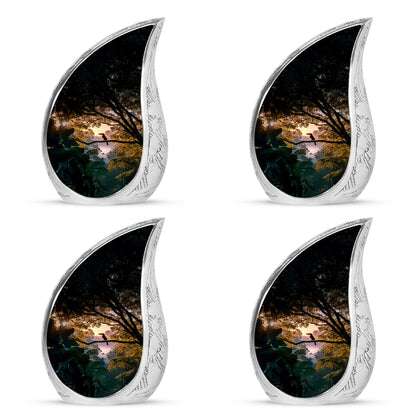 Onyx Black Hornbill Cremation Urn close-up of engraving and surface detail - graceful tear-shaped urn with hornbill motif - 10 inch aluminum urn for cremated remains