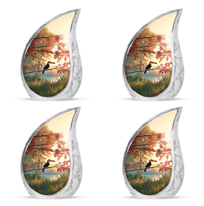 Champagne Gold Hornbill Cremation Urn close-up of engraving and surface detail - rounded teardrop hornbill design with delicate detail - 10 inch aluminum urn for cremated remains