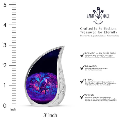 Royal Blue Hornbill Cremation Urn angled view of lid and engraved motif - graceful tear-shaped urn with hornbill motif - mini keepsake memorial for portion of cremation ashes