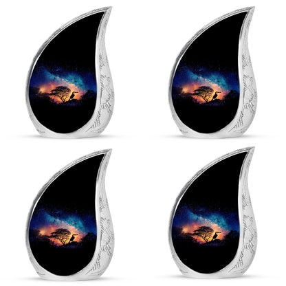 Misty Blue Hornbill Cremation Urn close-up of engraving and surface detail - flowing teardrop hornbill silhouette on curved aluminum - 10 inch aluminum urn for cremated remains