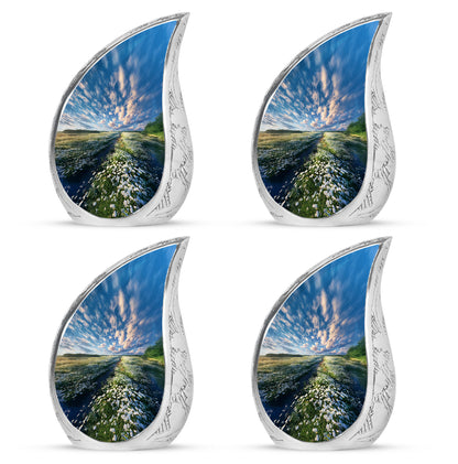 Powder Blue Daisy Cremation Urn close-up of engraving and surface detail - rounded teardrop daisy design with delicate detail - 10 inch aluminum urn for cremated remains