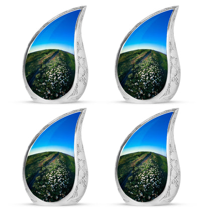 Mint Green Daisy Cremation Urn close-up of engraving and surface detail - smooth teardrop contour featuring daisy art - 10 inch aluminum urn for cremated remains