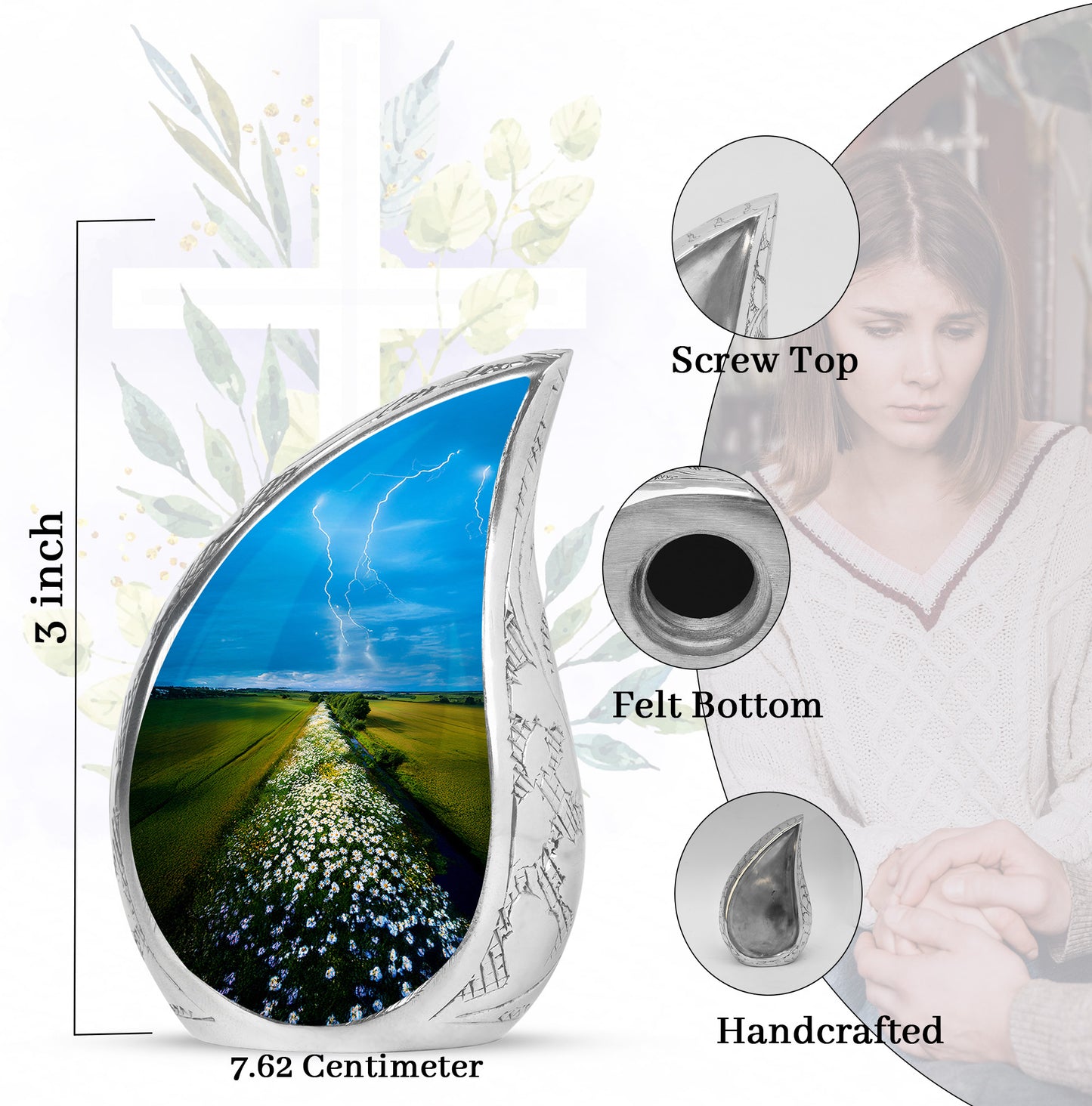 Steel Blue Daisy Cremation Urn angled view of lid and engraved motif - smooth teardrop contour featuring daisy art - mini keepsake memorial for portion of cremation ashes