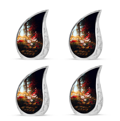 Gilded Gold Daisy Cremation Urn close-up of engraving and surface detail - flowing teardrop daisy silhouette on curved aluminum - 10 inch aluminum urn for cremated remains