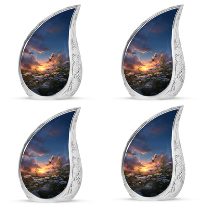 Celestial Blue Daisy Cremation Urn close-up of engraving and surface detail - flowing teardrop daisy silhouette on curved aluminum - 10 inch aluminum urn for cremated remains