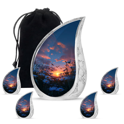 Indigo Daisy Cremation Urn side profile showing urn shape - rounded teardrop daisy design with delicate detail - memorial set with one large and four small urns