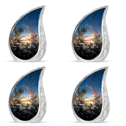 Calming Blue Daisy Cremation Urn close-up of engraving and surface detail - smooth teardrop contour featuring daisy art - 10 inch aluminum urn for cremated remains