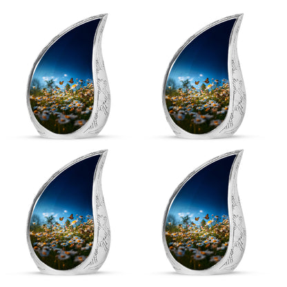 Dusty Blue Daisy Cremation Urn close-up of engraving and surface detail - rounded teardrop daisy design with delicate detail - 10 inch aluminum urn for cremated remains