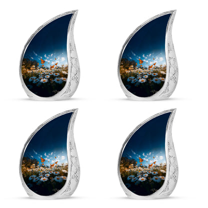Calming Blue Daisy Cremation Urn close-up of engraving and surface detail - graceful tear-shaped urn with daisy motif - 10 inch aluminum urn for cremated remains