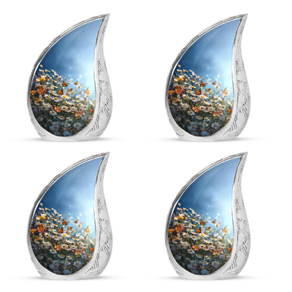 Royal Blue Daisy Cremation Urn close-up of engraving and surface detail - smooth teardrop contour featuring daisy art - 10 inch aluminum urn for cremated remains
