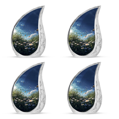 Cornflower Blue Daisy Cremation Urn close-up of engraving and surface detail - smooth teardrop contour featuring daisy art - 10 inch aluminum urn for cremated remains