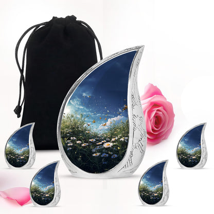 Sky Blue Daisy Cremation Urn side profile showing urn shape - rounded teardrop daisy design with delicate detail - memorial set with one large and four small urns