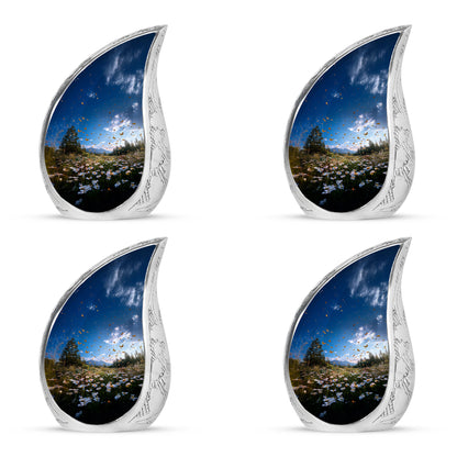 Vivid Blue Daisy Cremation Urn close-up of engraving and surface detail - smooth teardrop contour featuring daisy art - 10 inch aluminum urn for cremated remains