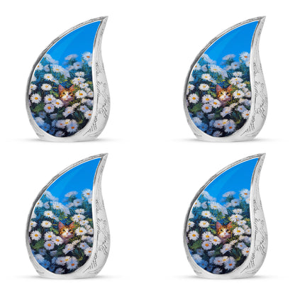 Calming Blue Daisy Cremation Urn close-up of engraving and surface detail - smooth teardrop contour featuring daisy art - 10 inch aluminum urn for cremated remains