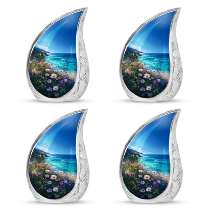 Royal Blue Daisy Cremation Urn close-up of engraving and surface detail - smooth teardrop contour featuring daisy art - 10 inch aluminum urn for cremated remains