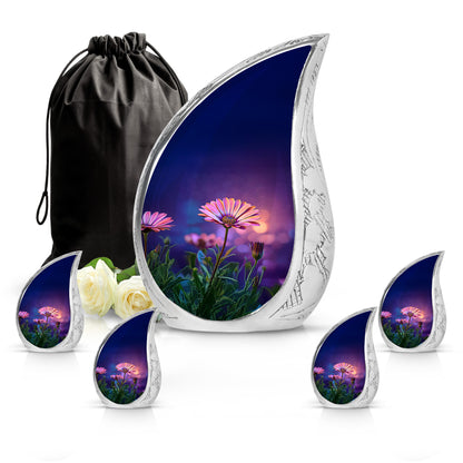 Soft Blue Daisy Cremation Urn side profile showing urn shape - graceful tear-shaped urn with daisy motif - memorial set with one large and four small urns