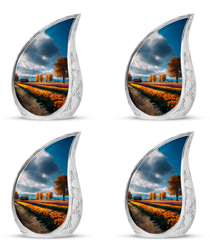 Dusty Blue Garden Tulip Cremation Urn close-up of engraving and surface detail - flowing teardrop garden tulip silhouette on curved aluminum - 10 inch aluminum urn for cremated remains