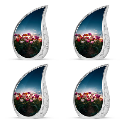 Bright Blue Garden Tulip Cremation Urn close-up of engraving and surface detail - graceful tear-shaped urn with garden tulip motif - 10 inch aluminum urn for cremated remains