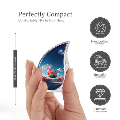 Cornflower Blue Garden Tulip Cremation Urn angled view of lid and engraved motif - smooth teardrop contour featuring garden tulip art - mini keepsake memorial for portion of cremation ashes