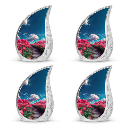 Royal Blue Garden Tulip Cremation Urn close-up of engraving and surface detail - smooth teardrop contour featuring garden tulip art - 10 inch aluminum urn for cremated remains
