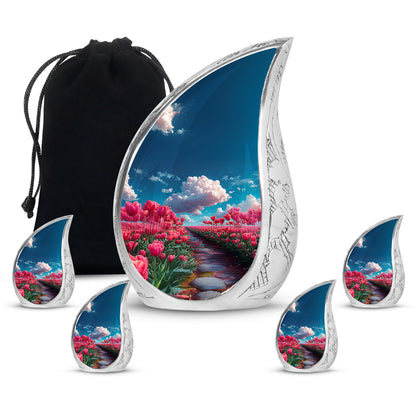 Dusty Blue Garden Tulip Cremation Urn side profile showing urn shape - flowing teardrop garden tulip silhouette on curved aluminum - memorial set with one large and four small urns