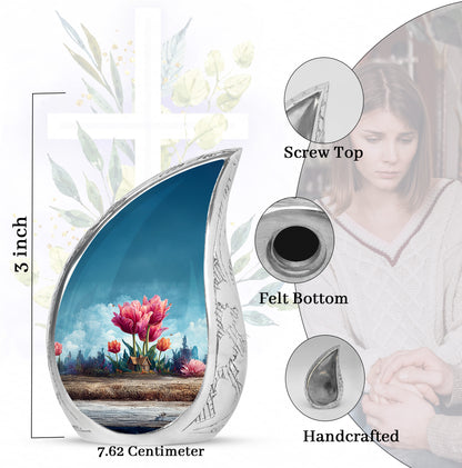 Azure Garden Tulip Cremation Urn angled view of lid and engraved motif - rounded teardrop garden tulip design with delicate detail - mini keepsake memorial for portion of cremation ashes